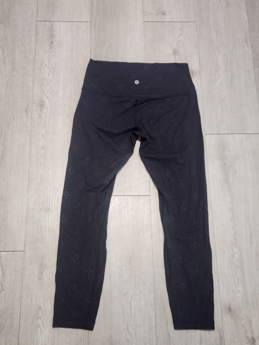Lululemon Black Embossed Monogram Logo Leggings 25"